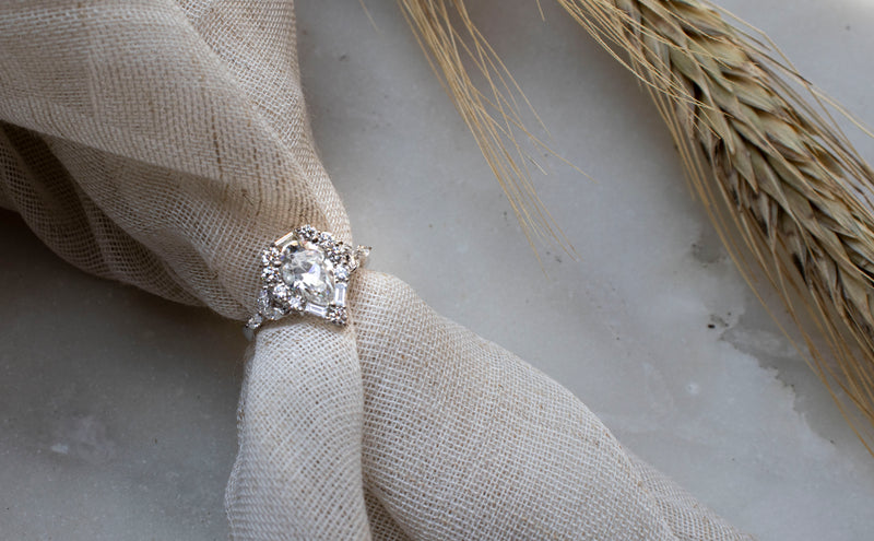 Pear Cut Baguette and Round Diamond Halo Ring