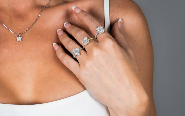 Oval Cut Baguette and Round Diamond Halo Ring