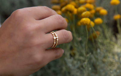 Gold Ball and 3 Diamond Spaced Ring