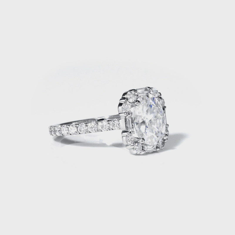 Oval Cut Baguette and Round Diamond Halo Ring
